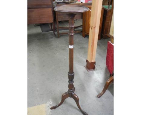 A mahogany torchere on tripod base, COLLECT ONLY.