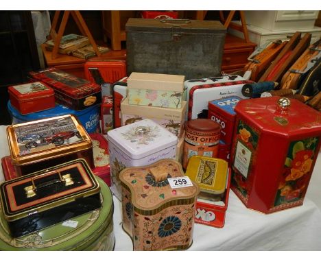 A large box of vintage tins.
