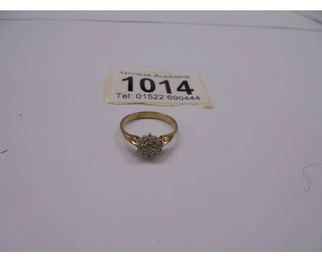 A 9ct gold floral diamond ring, size L, 1.9 grams.