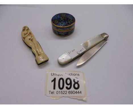 A silver penknife, a 1930's penknife with female nude and an enamel box.