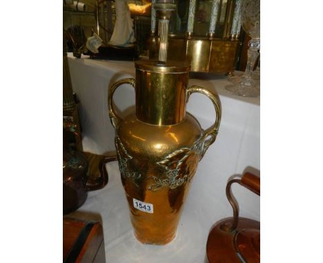 A brass table lamp base.