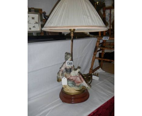 A figural table lamp with shade, COLLECT ONLY.