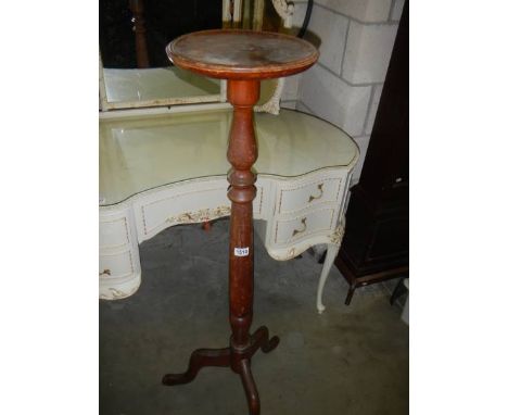 A mahogany torchere on tripod base, COLLECT ONLY.