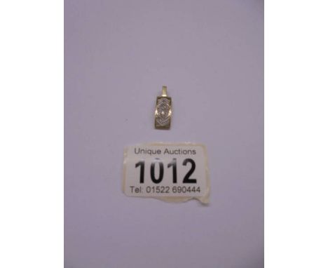A white gold and diamond pendant, 1,5 grams,