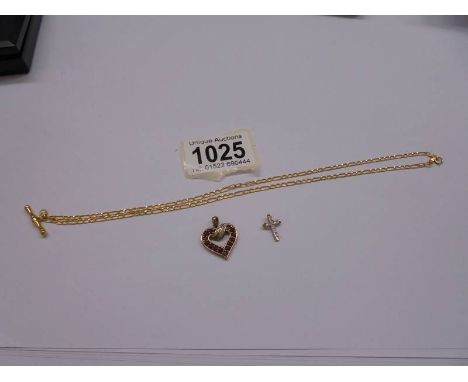 A 9ct gold chain, heart pendant and cross. 5 grams.