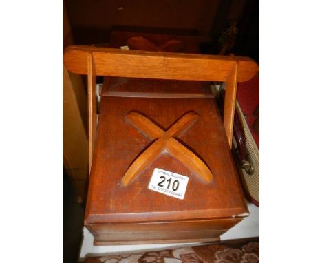 An empty vintage sewing box.