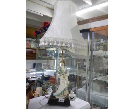 A figural table lamp. COLLECT ONLY.