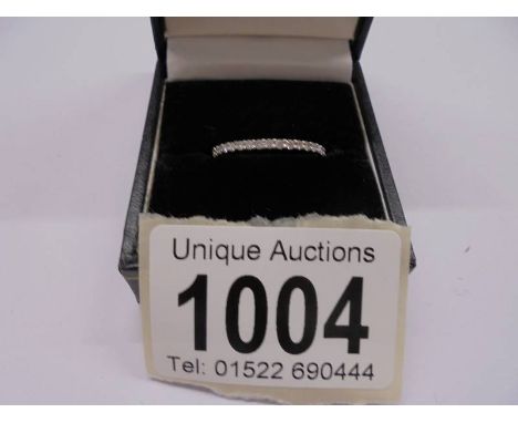 A half carat white gold full eternity ring set brilliant diamonds, size N, 1.4 grams.