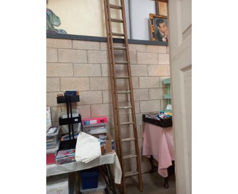 A double section wooden ladder with aluminium rungs COLLECT ONLY