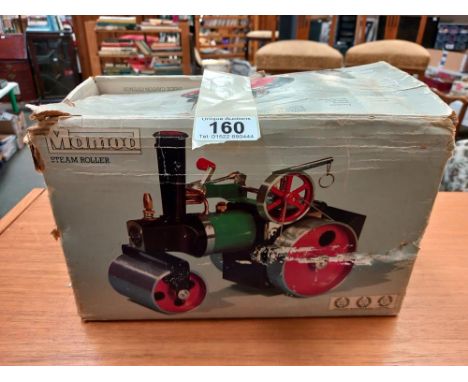 A boxed Mamod steam roller with box of Mamod fuel tablets