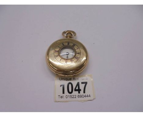 A gold plated half hunter pocket watch, Elgin USA, in working order.In Working Order, Plated finish in good condition 