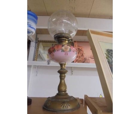 An oil lamp with brass base, hand painted glass font and acid etched shade, COLLECT ONLY.