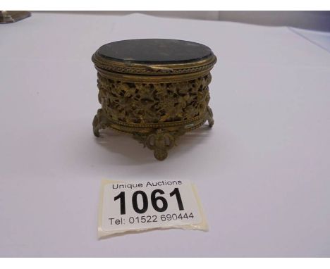 An early 20th century French trinket box with glass top.