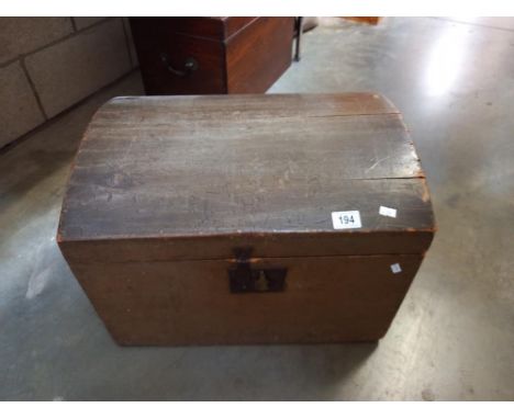 A 19th/20th century dome top trunk, lined with period advertising newspapers COLLECT ONLY