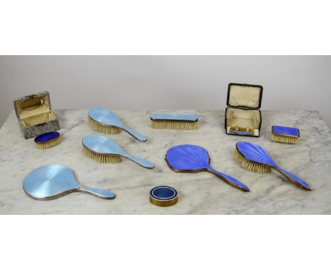 HAND MIRRORS AND BRUSHES, early 20th century turquoise and blue guilloche enamel, approx nine pieces. (Qty) 