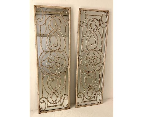 ARCHITECTURAL WALL MIRRORS, a pair, regency style, aged metal frames, 162cm H x 51cm W. (2) 