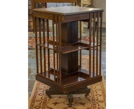 REVOLVING BOOKCASE, 89cm H x 49cm W x 49cm D, Edwardian rosewood and inlaid on ceramic castors. 