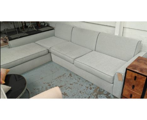 CORNER SOFA, 255cm x 500cm x 79cm H, in two sections, blue upholstered with piping. 