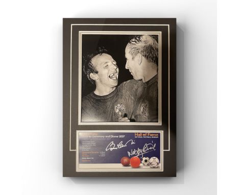 Nobby Stiles and Bobby Charlton Manchester United Legends Signed Dinner Ticket Display. Good condition. All autographs come w