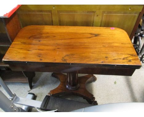 An early 19th century rosewood card table 