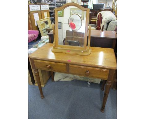 A modern pine side table with two small drawers, together with a modern pine dressing table mirror 