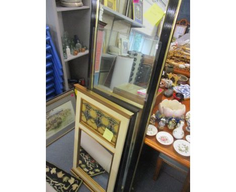 Two mirrors to include a black and gold painted, rectangular wall mirror, 21 1/2" x 64 1/2" 