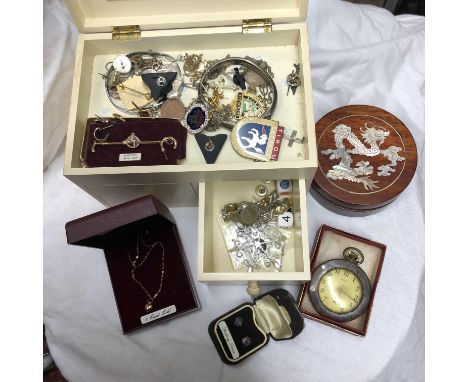 BOX CONTAINING SILVER CROSS ON TRACE CHAIN, SILVER ENGRAVED BANGLE, ENAMEL LAPEL BADGES, EARRINGS AND A 9CT GOLD MINIATURE HE