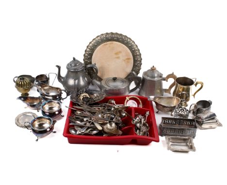 An assortment of silver-plate and pewter. Including teapots, tankards, flatware, a cream jug, knife rests, etc. 