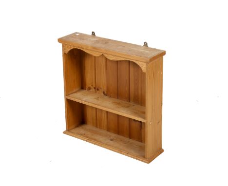 A contemporary pine wall mounted shelf. Having one fixed shelf. H65.5cm x W67.5cm x D18cm