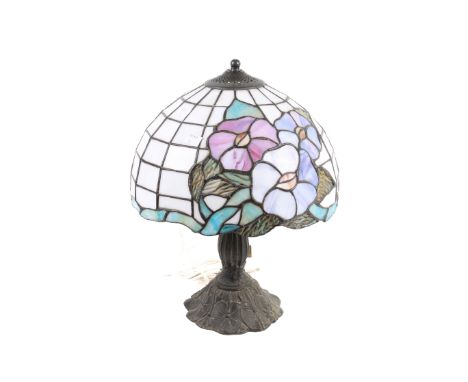 A contemporary table lamp with leaded milk glass shade. H41cm