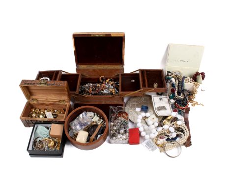 An assortment of costume jewellery and boxes. Including a vintage Stewart Dawson & Co Ltd brown leather jewellery box, a came