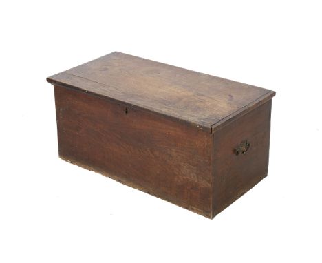 A vintage oak trunk blanket box chest. With a later paper lining. H42cm x W88cm x D47cm