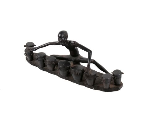 A vintage African tribal Kenyan ebony carving of a drummer. Depicting the blind drummer, Morris Nyunyusa, who died in 1999. H