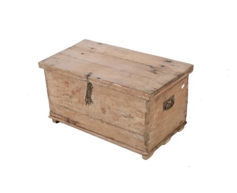 A rustic wooden blanket box trunk. With wrought iron hinges and clasp, lid opening to reveal candle box, raised on bracket fe