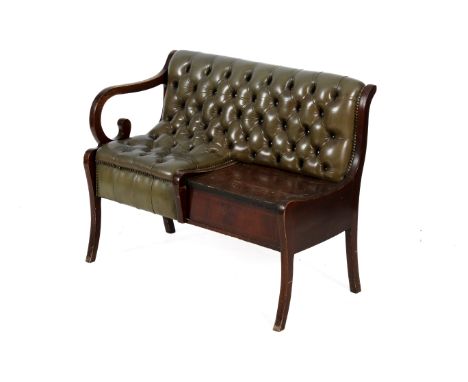 A mid-century regency style button back telephone seat. Having olive green leatherette seat and back with side drawer, raised