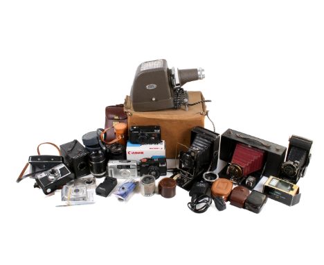 A collection of assorted vintage film cameras and accessories. Including a Zeiss Ikon folding bellows camera, AGFA Optima Sen
