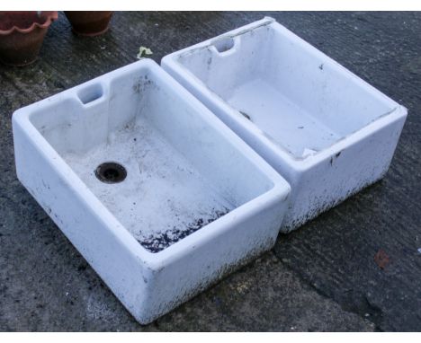A pair of white ceramic Belfast sinks. H25cm x W60cm x D45cm