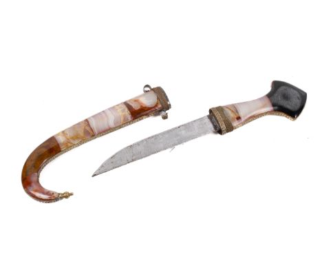 A 20th century middle Eastern 'jambiya' dagger. Having semi-precious stone grip and scabbard. Total length 38cm