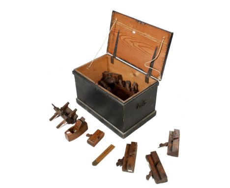 An antique carpenter's tools chest and contents. Having mostly planes and spokeshaves, etc. H41cm x W64cm x D40cm