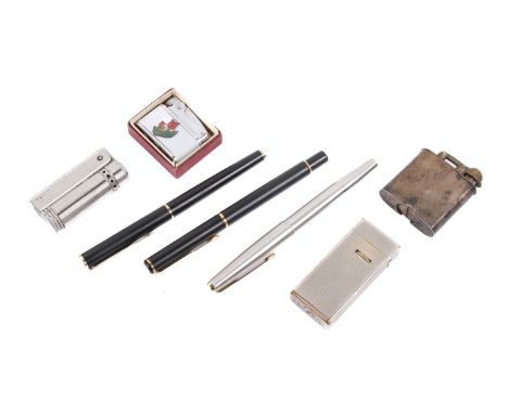 Three Parker pens and four lighters. The pens including an example with a 14K nib, the lighters including a Venus Penguin, a 