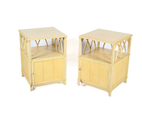 A pair of contemporary painted yellow bedside cabinets. Each with a cupboard beneath an open shelf. H68cm x W51cm x D51cm