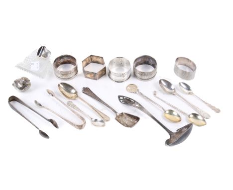 An assortment of 19th and 20th century silver and silver plate. Including four silver and white metal napkin rings, 111.1g gr