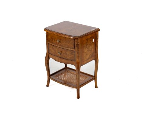 A contemporary walnut and crossbanded veneer two drawer lamp table. Having craved cabriole supports united by a cane work she