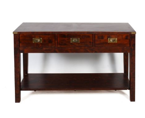 A Laura Ashley Home stained wood three drawer console table. Raised on square supports united by a shelf. H84cm x W136cm x D4