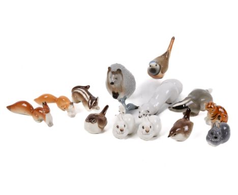 A collection of fourteen Lomonosov USSR Russian ceramic animals. Including a tiger cub, hedgehog and badger, etc. Max. H8cm