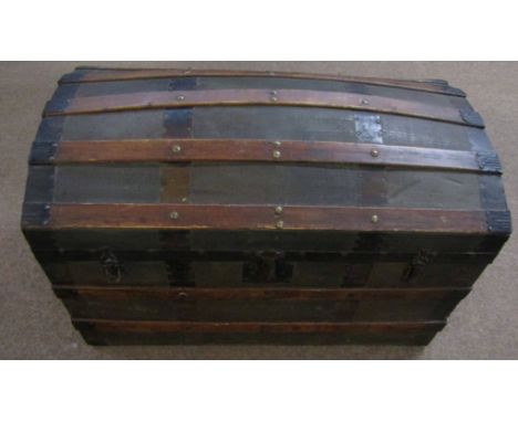 Early 20th century pine banded domed top trunk with metal strapwork and mounts, 87cm long