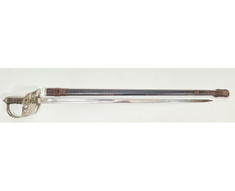 George V Infantry Officers Sword. A good example of the regulation pattern. The blade with faint engraved decoration. The hil