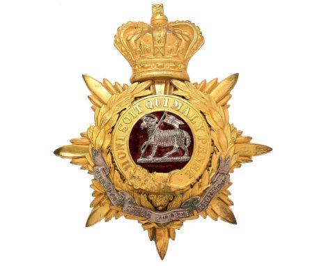 Royal West Surrey Regiment Victorian Officer helmet plate circa 1881-1901.  Fine gilt crowned star mounted with Garter and la