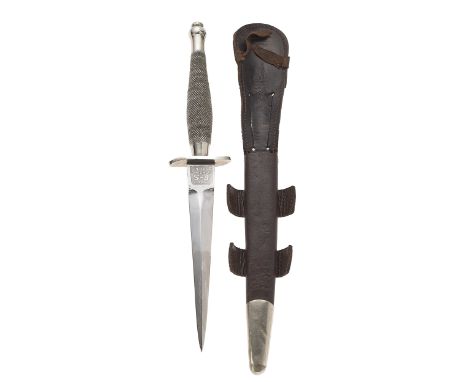 WW2 1st pattern Fairbairn-Sykes Commando fighting knife.  A very good and rare example. The hilt with nickel grip of chequere