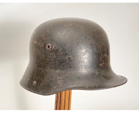 Imperial German WW1 Steel Helmet. This example with leather liner band to the interior retaining three part leather lining tw
